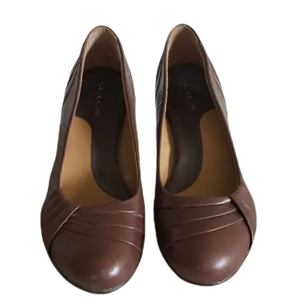 Brown slip on Kitten Heel by Solos size 8